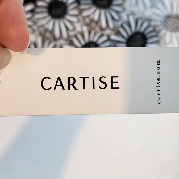 NWT Cartise Black Cut Out Sleeve Bottom Angled Top with Appliqued Flower Trim - Picture 9 of 12